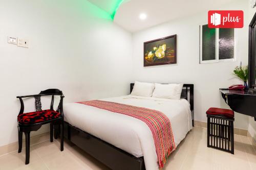 Postelja oz. postelje v sobi nastanitve Saigon Pink Hotel