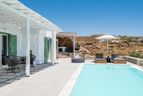 Bazén v ubytovaní Dioni Villa Mykonos alebo v jeho blízkosti