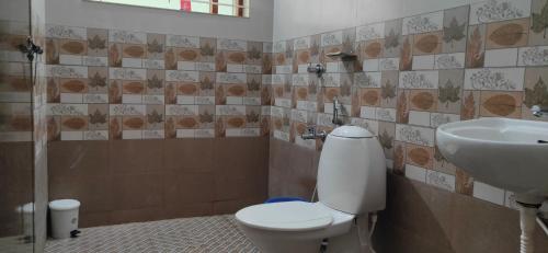Koupelna v ubytování RAIN DROPS PREMIUM VILLAS - Athirappilly