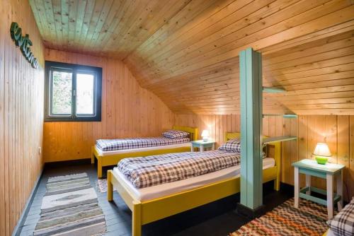 מיטה או מיטות בחדר ב-Piricske Pihenőház