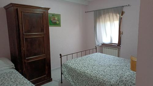 Postel nebo postele na pokoji v ubytování Pian d'Isola