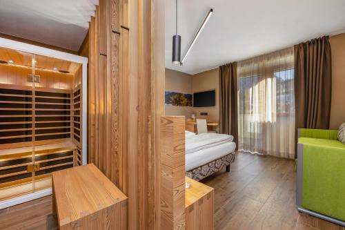 Una cama o camas en una habitación de Hotel Vittoria - Ricarica l'anima