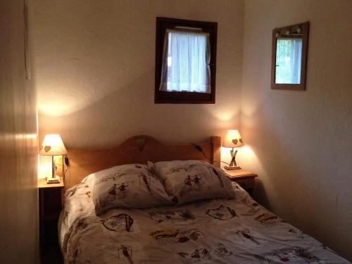 Säng eller sängar i ett rum på Appartement Valloire, 3 pièces, 6 personnes - FR-1-263-514