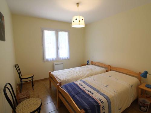 Posteľ alebo postele v izbe v ubytovaní Maison Saint-Georges-d'Oléron, 5 pièces, 6 personnes - FR-1-246A-131