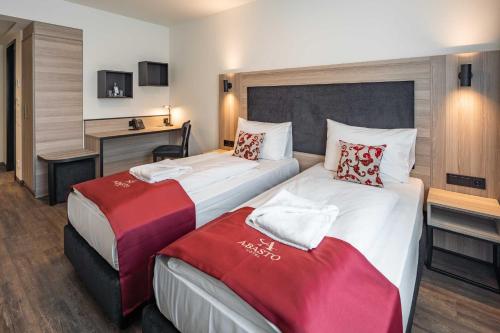 Postel nebo postele na pokoji v ubytování Abasto Hotel Dachau