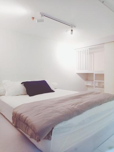 Cama ou camas em um quarto em Small living space