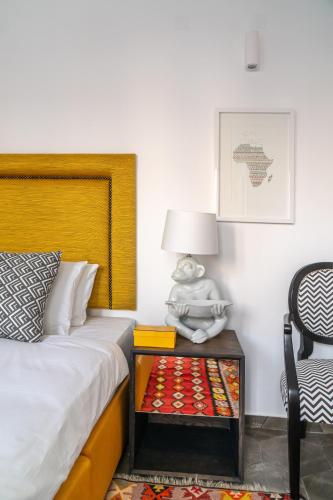 Katil atau katil-katil dalam bilik di Mare Gaia Apartments