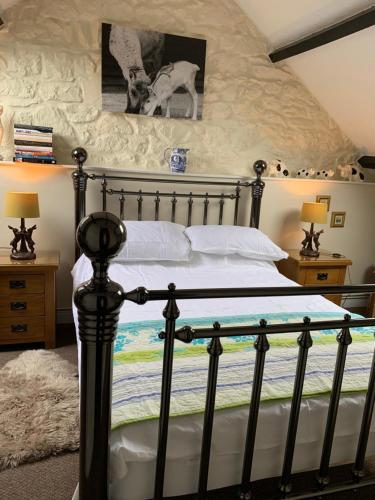 Postel nebo postele na pokoji v ubytování Wren Cottage