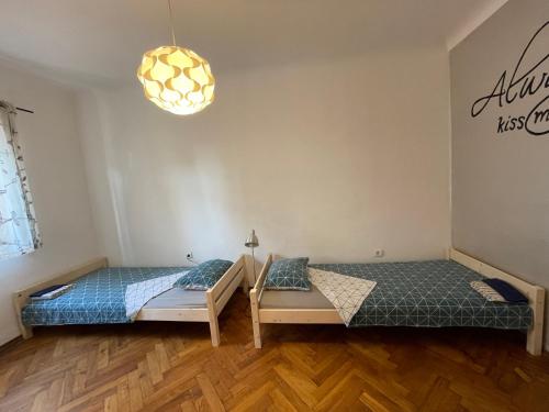 Apartment Carina 2 tesisinde bir odada yatak veya yataklar