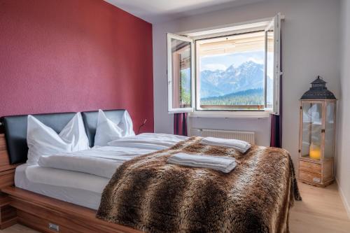 Postel nebo postele na pokoji v ubytování -Panorama-Bergblick- Dampfbad-Dusche und Aussenbett