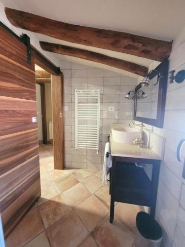 a bathroom with a sink and a mirror at CASA RURAL SANTA AGUEDA in Jaraba