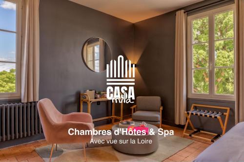 Χώρος καθιστικού στο Casa Mila & Spa - Maison d'Hôtes raffinée vue Loire, Spa & Piscine