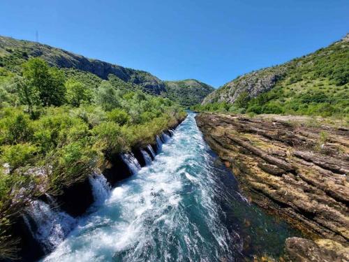 a view of a river flowing through a canyon at Vacation Home My Dream in Buna