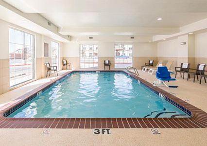 a large swimming pool in a hotel room at Comfort Inn Midland South I-20 in Midland