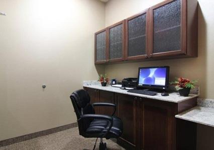 an office with a desk with a computer on it at Comfort Inn Midland South I-20 in Midland