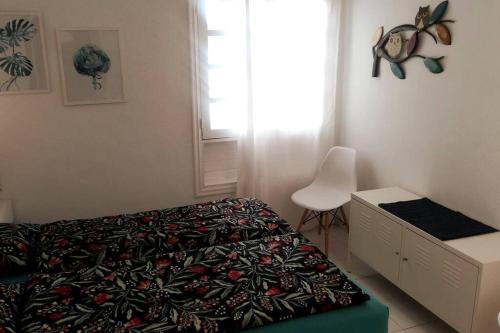 Postel nebo postele na pokoji v ubytování TUSCAN Apartment mit Meerblick und Sonnenterrasse