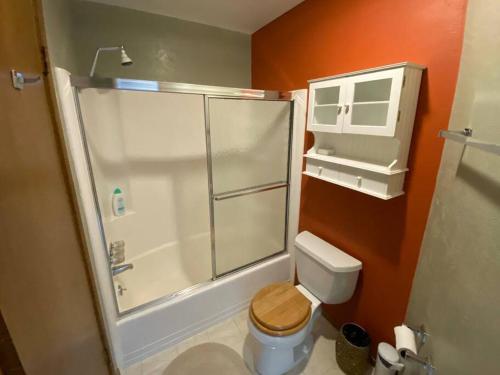 a bathroom with a toilet with a glass shower at Mammoth Awesome Location-1 min to Shuttles & Food! TOML-CPAN-11402 in Mammoth Lakes