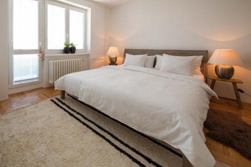 Postel nebo postele na pokoji v ubytování apartmán NA NOC V BOHDANČI