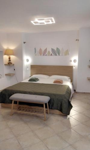 Postel nebo postele na pokoji v ubytování Ilias House