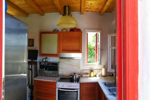 Kuchyň nebo kuchyňský kout v ubytování ArtHome0B