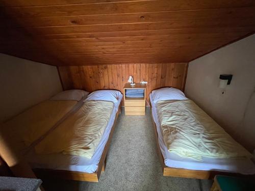 Postel nebo postele na pokoji v ubytování PENZION VIB Nová Živohošť