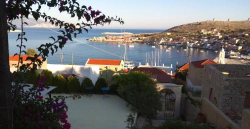 a view of a harbor with boats in the water at Marina Castellana Studios II in Halki