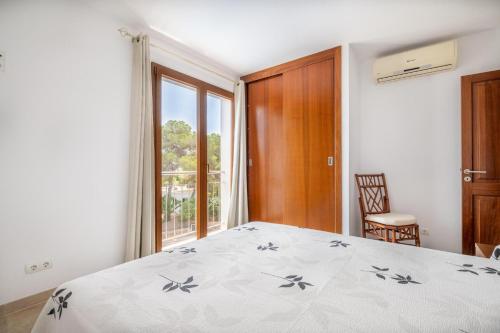 Katil atau katil-katil dalam bilik di Apartaments Vaixell