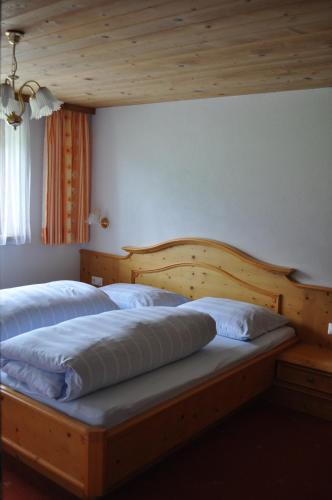 Postel nebo postele na pokoji v ubytování Haus Tina