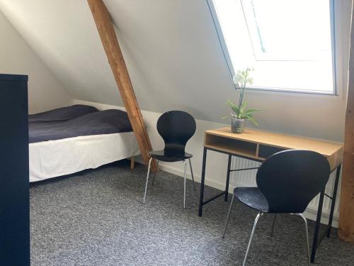 Postel nebo postele na pokoji v ubytování Residens Svalhøj
