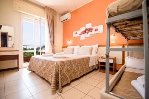 Postel nebo postele na pokoji v ubytování Unique Hotel