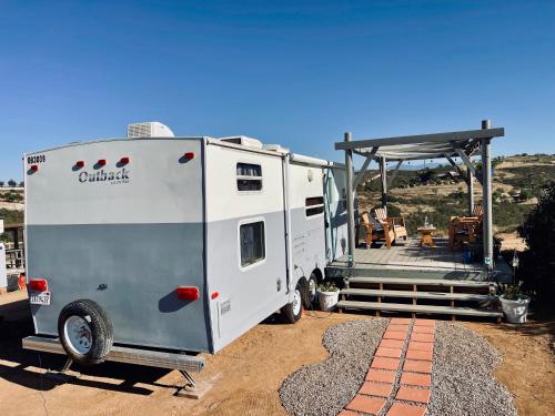 an rv parked next to a gazebo at Rustic Farm Stay in Temecula