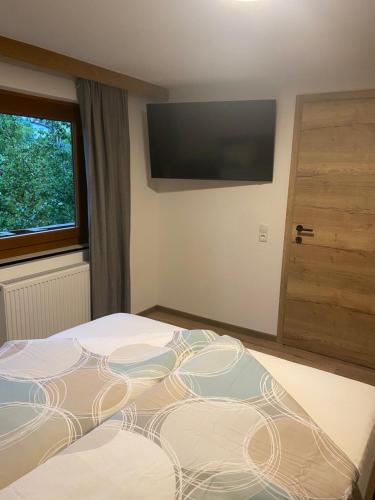 Postel nebo postele na pokoji v ubytování Haus Waldfrieden