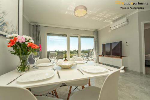TV a/nebo společenská místnost v ubytování Baltic Apartments - Apartamenty Bałtyk Bay View