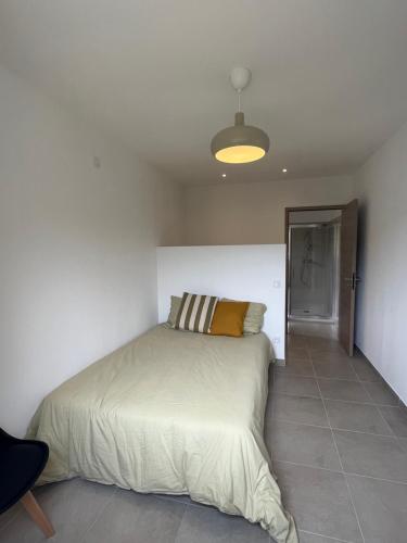 Katil atau katil-katil dalam bilik di Appartement Soveria
