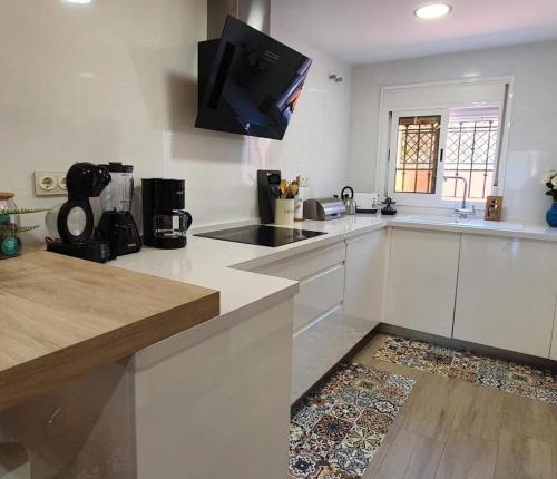 Una cocina o zona de cocina en Cosy and Modern Apartment in Fuengirola