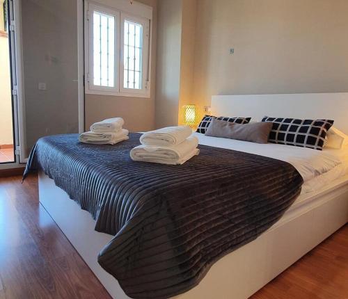 Posteľ alebo postele v izbe v ubytovaní Cosy and Modern Apartment in Fuengirola
