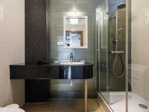 Kúpeľňa v ubytovaní CracWoW VIP Apartment