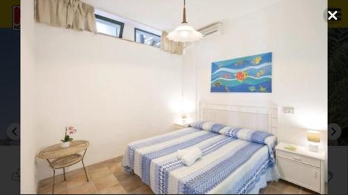 Postel nebo postele na pokoji v ubytování Appartamento costa dei Monaci- Tropea