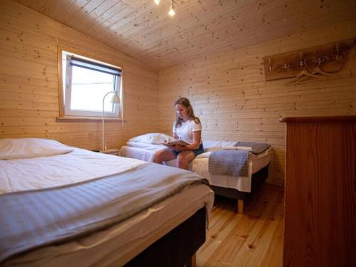 Postel nebo postele na pokoji v ubytování Bungalow in Miedzyzdroje near Baltic Beach