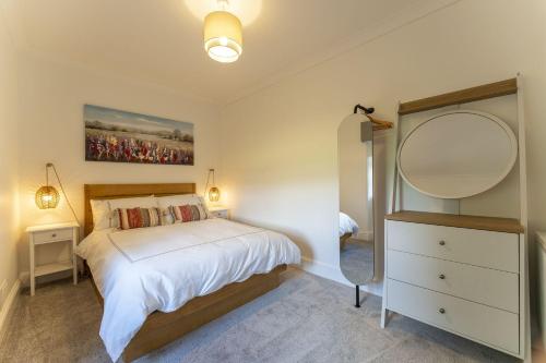 Katil atau katil-katil dalam bilik di Wilsons Cottage