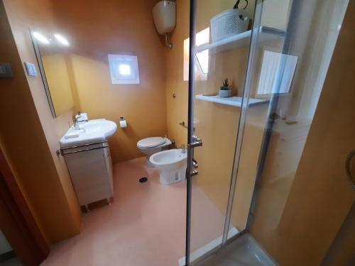 a bathroom with a toilet and a sink and a shower at Villa Paradise (Amalfi Coast - Luxury Home - Beach) in Vietri sul Mare