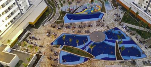 an overhead view of a pool in a resort at Apartamento Resort Aguas Park Resort Olímpia in Olímpia