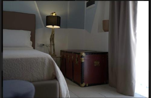 Postel nebo postele na pokoji v ubytování B&B Torre Sibissi Bari