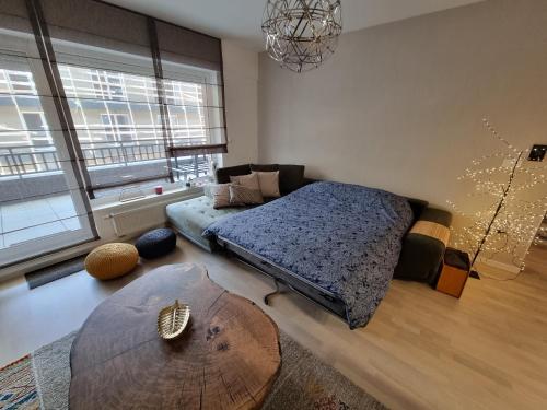 Giường trong phòng chung tại Mountain Wings Bjelasnica Apartment