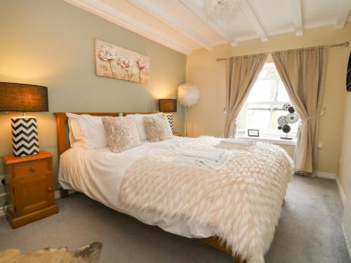 เตียงในห้องที่ St Edmunds House