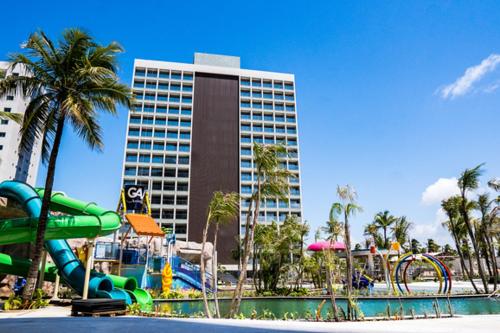 a resort with a water park with a water slide at Salinas Premium Resort 409 in Salinópolis