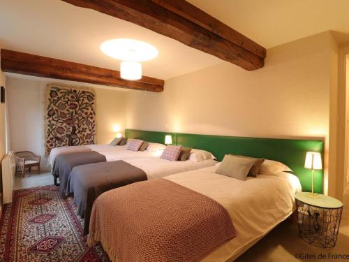 Katil atau katil-katil dalam bilik di Gîte Tinchebray-Bocage-Frênes, 5 pièces, 10 personnes - FR-1-497-154