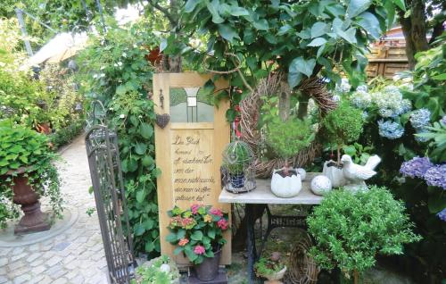 a garden with flowers and plants on a table at Nice Apartment In Bad Schlema Ot Wildb in Schneeberg