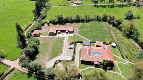 an aerial view of a large estate with a house at Hospedaje Villa Eucalyptus in Nobsa