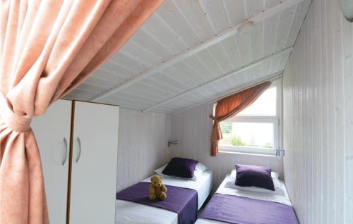 Säng eller sängar i ett rum på Strandblick 6 - Dorf 1